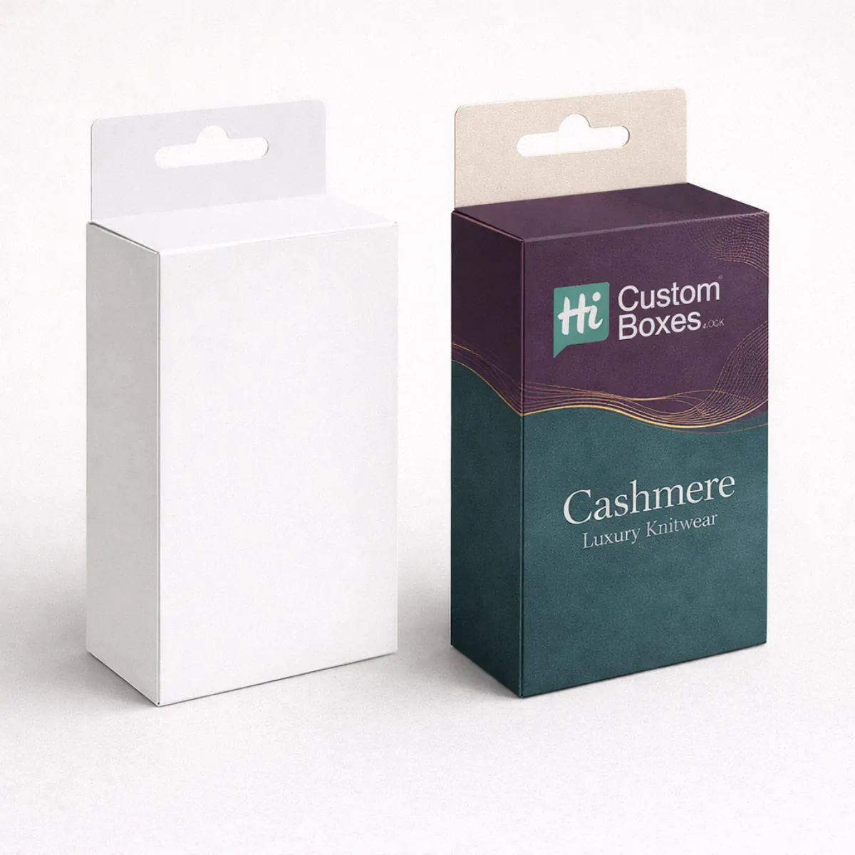 Two vertical hanging retail boxes with die-cut somber tabs- one white and one with luxury knitwear branding- class=